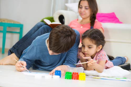 Children playing happily in a cool, comfortable home during summer